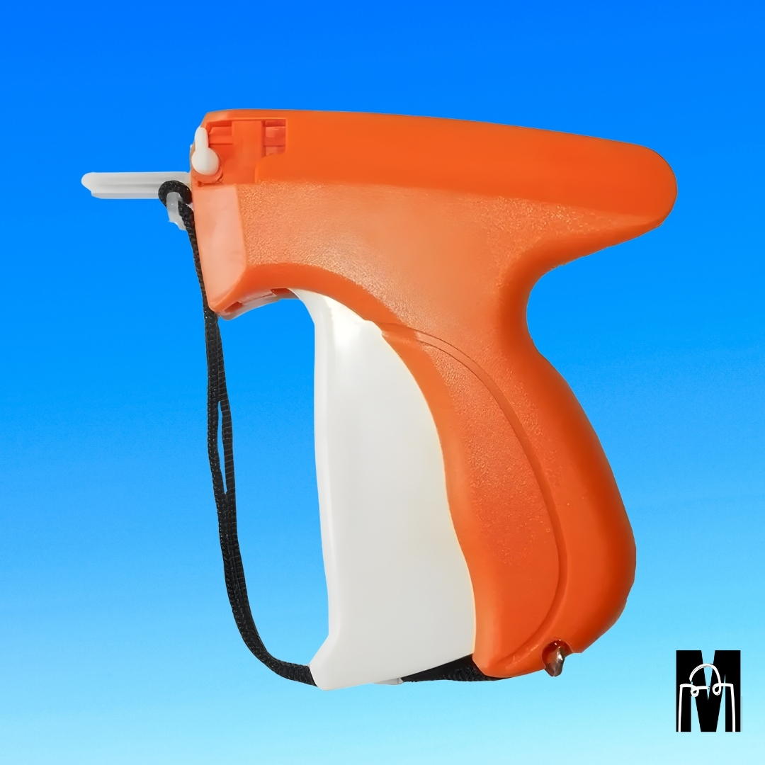 Pistola aplicadora de tag laranja para etiquetas de roupas.